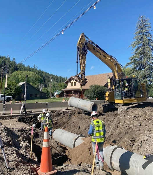 one of the many reasons excavation work on storm and sewer lines is tricky. You have to be paying attention to the overhead utility lines